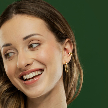 Komplet biżuterii: srebrne pozłacane kolczyki owalne i nausznica gładka